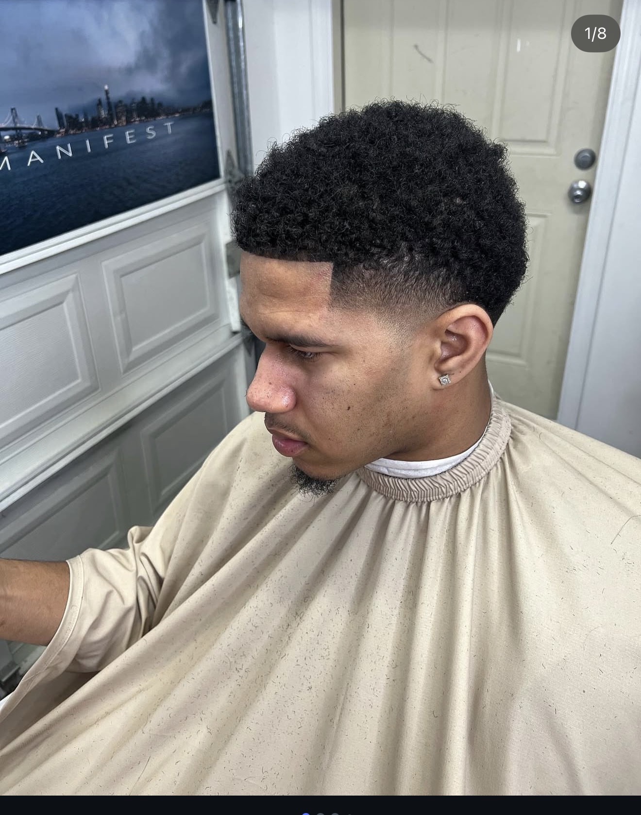 Afro blowout with low taper fade by Javistylz Bay Area